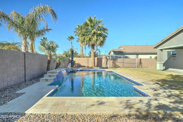 view of swimming pool with a patio area