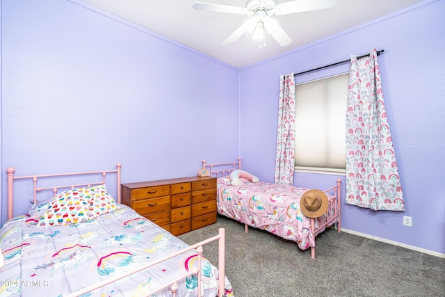 bedroom with baseboards, a ceiling fan, and carpet