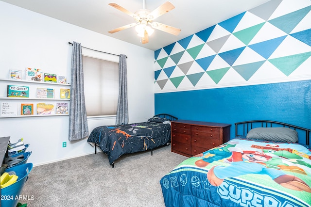 carpeted bedroom featuring a ceiling fan