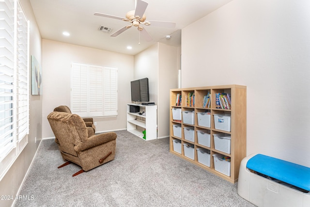 living area with visible vents, baseboards, carpet, recessed lighting, and a ceiling fan