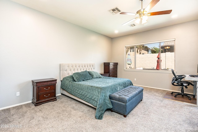 bedroom featuring baseboards, visible vents, carpet floors, and ceiling fan