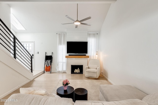 5350 N 3rd Ave, Phoenix, AZ 85013 - living area featuring stairs, baseboards, ceiling fan, and wood finished floors