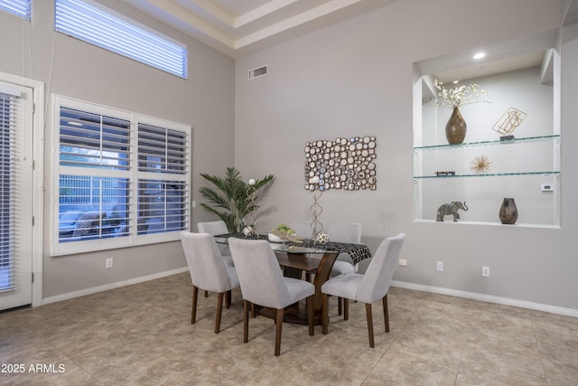 dining room featuring tile patterned floors, recessed lighting, baseboards, and visible vents