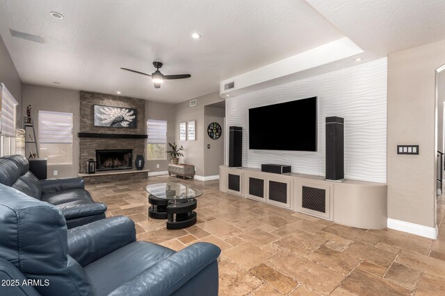 1751 W Mulberry Dr, Chandler, AZ 85286 - living room with stone tile floors, a ceiling fan, recessed lighting, and a stone fireplace