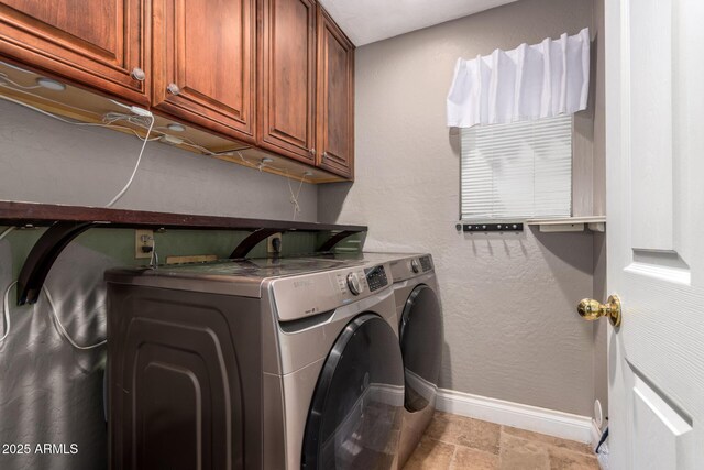 1751 W Mulberry Dr, Chandler, AZ 85286 - laundry area featuring cabinet space, washing machine and clothes dryer, and light stone finish floors
