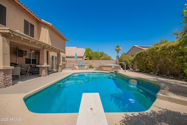 1751 W Mulberry Dr, Chandler, AZ 85286 - view of pool with a patio area, a diving board, and a fenced backyard
