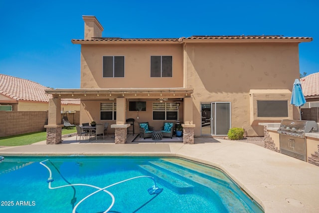 1751 W Mulberry Dr, Chandler, AZ 85286 - view of pool featuring exterior kitchen, a patio area, an outdoor hangout area, and a ceiling fan