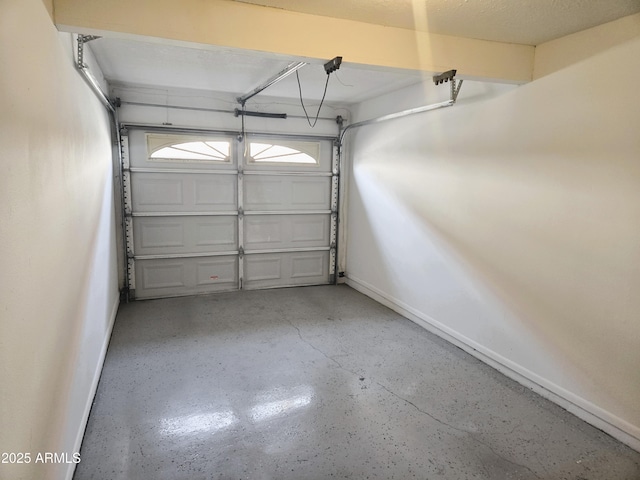 garage featuring baseboards