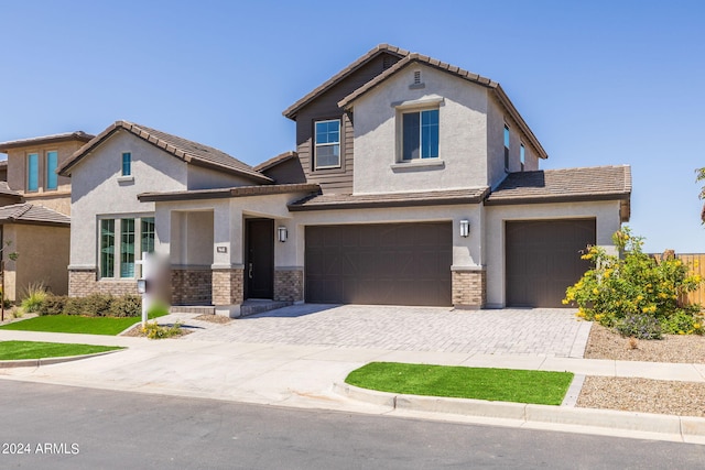 view of front of property with a garage