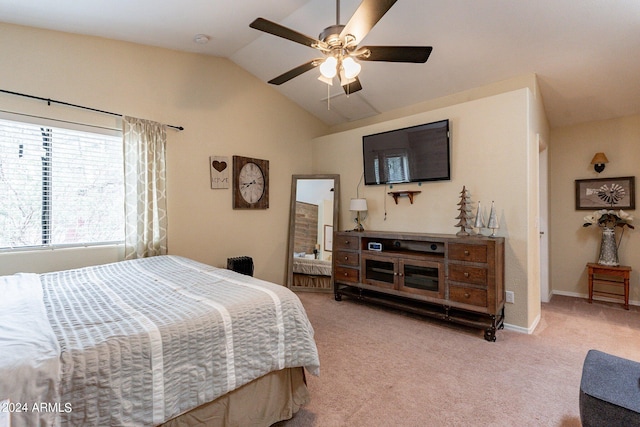 carpeted bedroom featuring vaulted ceiling and ceiling fan