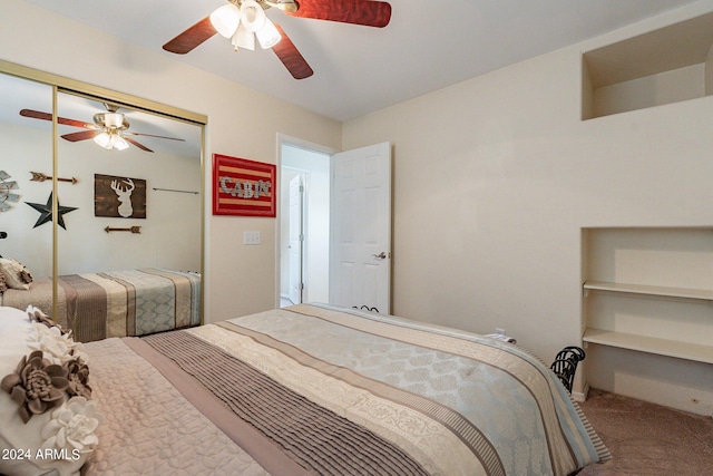 carpeted bedroom with a closet and ceiling fan