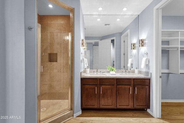 16210 E Links Dr, Fountain Hills, AZ 85268 - bathroom with a shower stall, a sink, and wood finished floors
