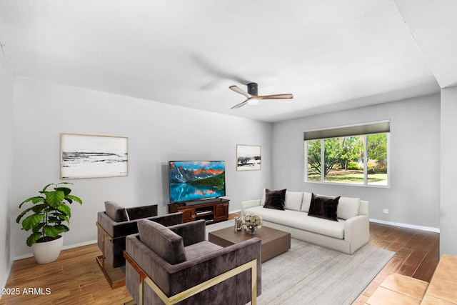 living room featuring ceiling fan