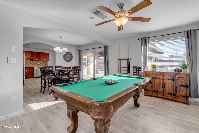 recreation room featuring ceiling fan with notable chandelier and billiards