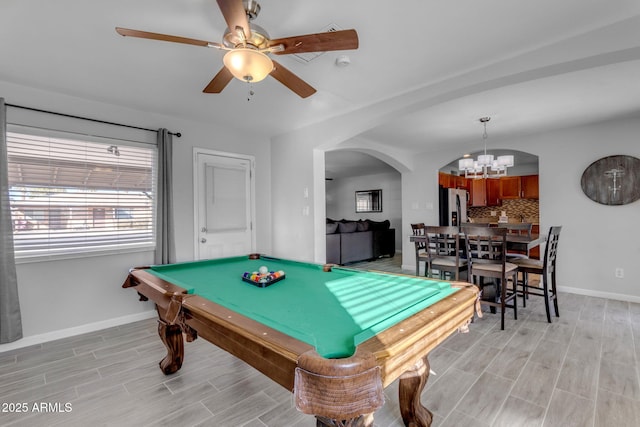 playroom with light hardwood / wood-style flooring, ceiling fan with notable chandelier, and pool table