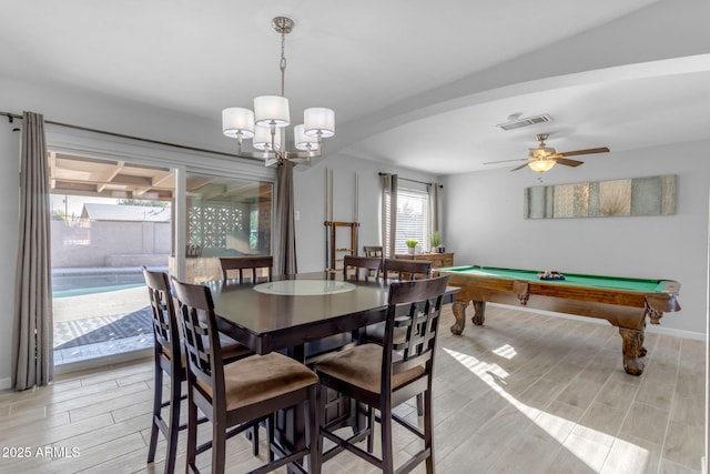 dining area featuring ceiling fan with notable chandelier and billiards