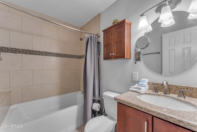 full bathroom featuring vanity, shower / bath combo, and toilet