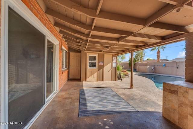 view of patio featuring a fenced in pool