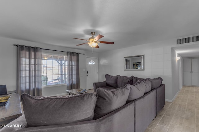 living room with ceiling fan