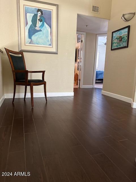 unfurnished room featuring dark hardwood / wood-style flooring