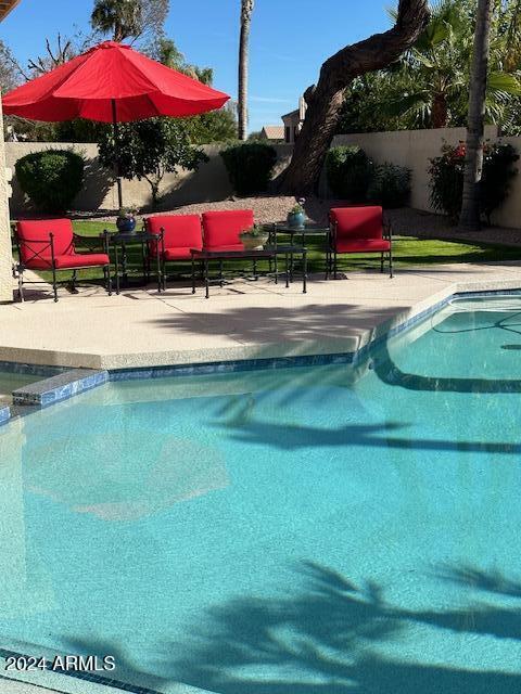 view of pool with a patio