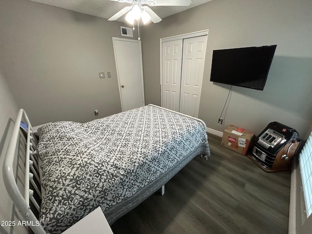 5143 W Mountain View Rd, Glendale, AZ 85302 - bedroom with wood finished floors, a closet, a ceiling fan, and baseboards