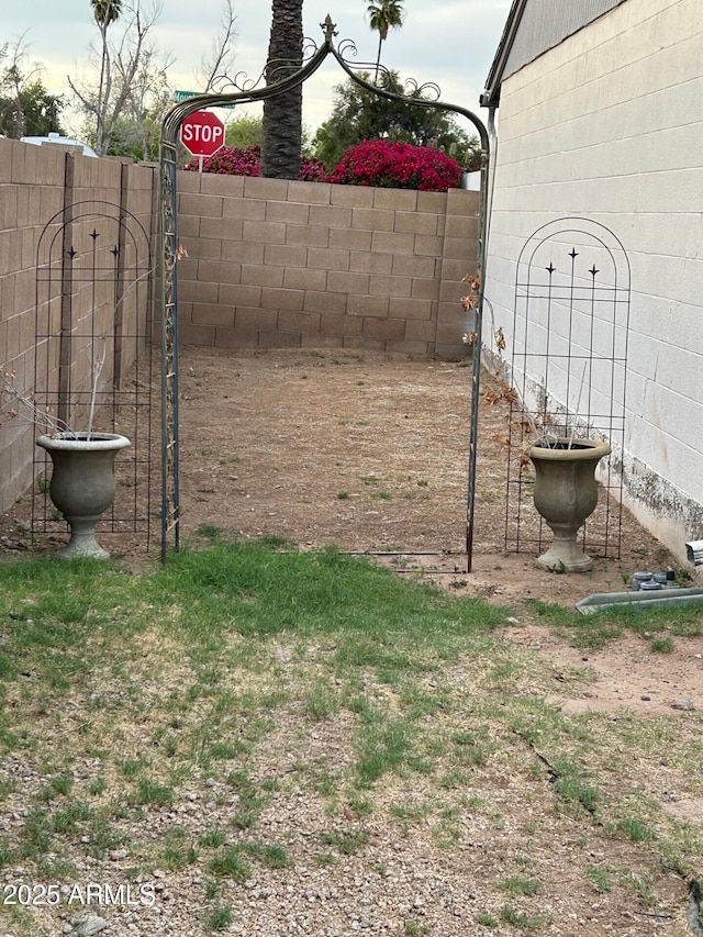 5143 W Mountain View Rd, Glendale, AZ 85302 - view of yard featuring a gate