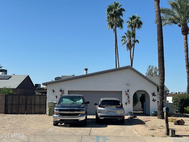 5143 W Mountain View Rd, Glendale, AZ 85302 - view of front of property featuring driveway, a garage, and stucco siding
