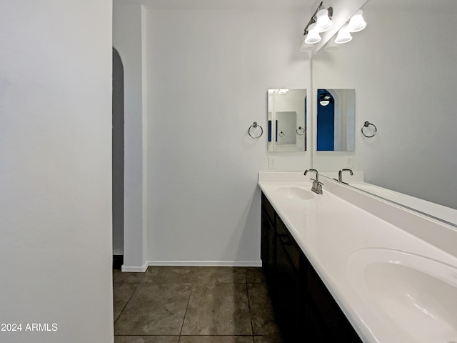 bathroom with tile patterned floors and vanity