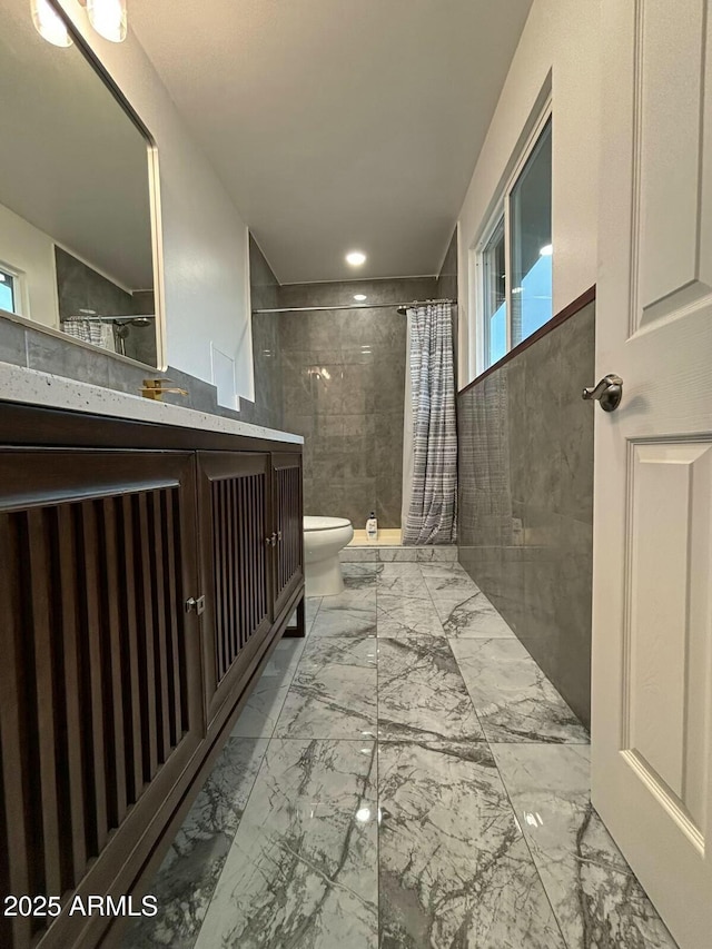 5431 W Cholla St, Glendale, AZ 85304 - bathroom featuring toilet, a shower stall, marble finish floor, and vanity