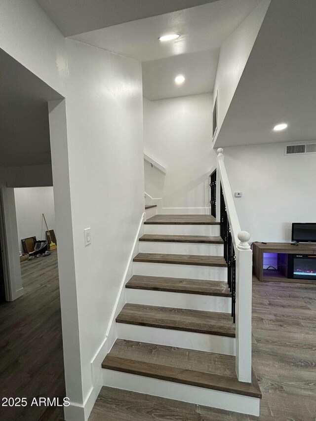 5431 W Cholla St, Glendale, AZ 85304 - stairway with recessed lighting, visible vents, and wood finished floors