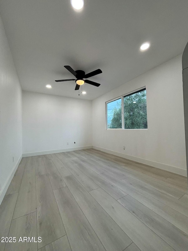 5431 W Cholla St, Glendale, AZ 85304 - empty room featuring light wood finished floors, baseboards, a ceiling fan, and recessed lighting