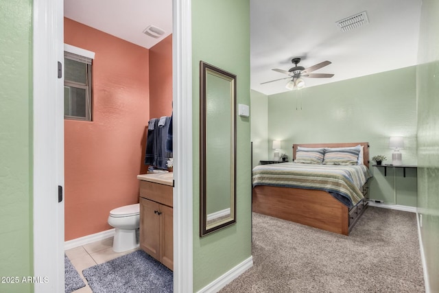 bedroom with light tile patterned floors, baseboards, and visible vents