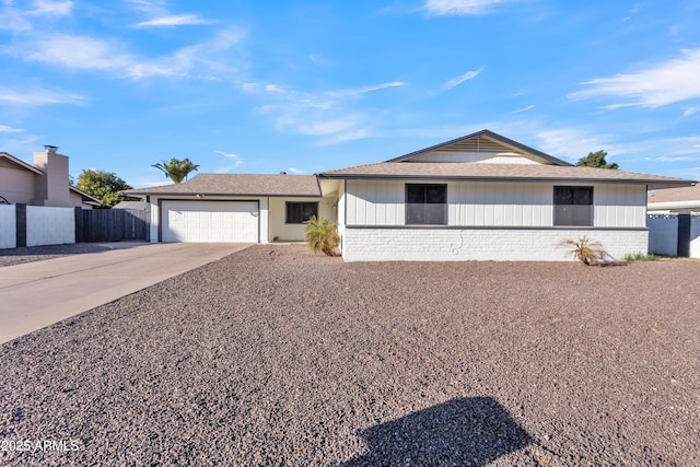 single story home featuring a garage