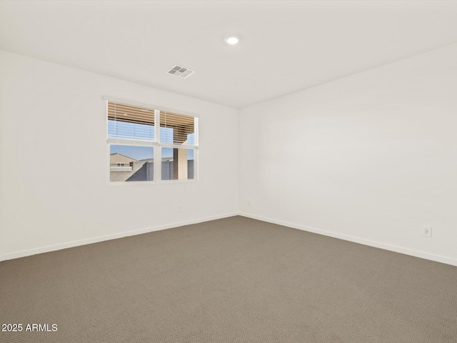 unfurnished room with carpet