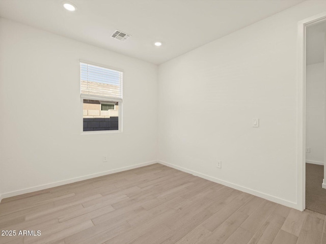 empty room with light wood-type flooring