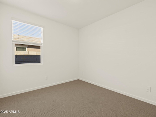 spare room with carpet flooring