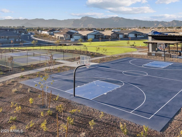 view of basketball court with a mountain view