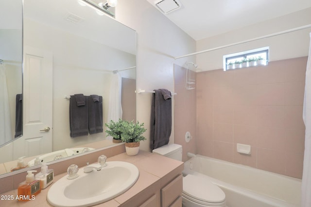 full bathroom featuring vanity, toilet, and shower / bath combo