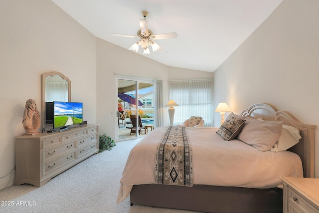 carpeted bedroom with ceiling fan, vaulted ceiling, and access to outside