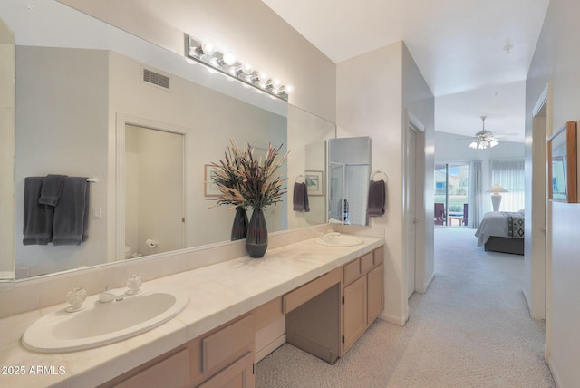 bathroom with vanity, ceiling fan, and toilet