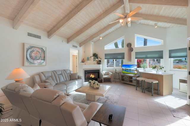 living room with beam ceiling, high vaulted ceiling, wooden ceiling, and light tile patterned flooring