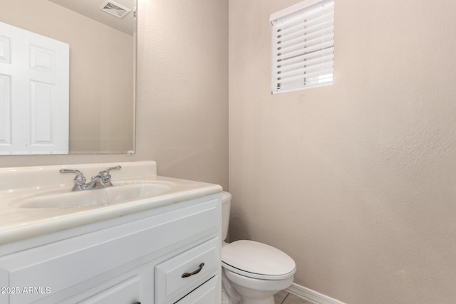 7029 S Golfside Ln, Phoenix, AZ 85042 - half bath featuring vanity and toilet