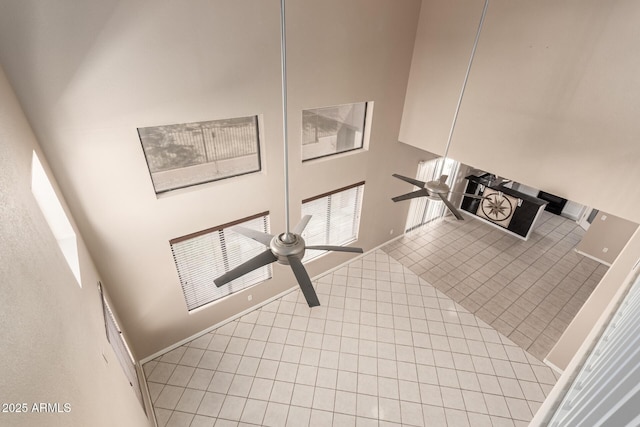 7029 S Golfside Ln, Phoenix, AZ 85042 - stairs featuring ceiling fan and tile patterned flooring