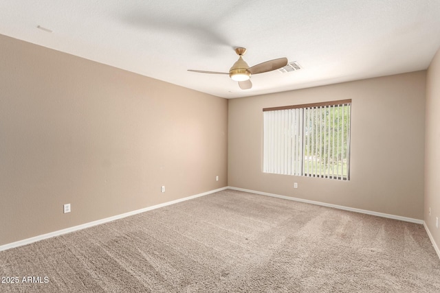 7029 S Golfside Ln, Phoenix, AZ 85042 - carpeted spare room with ceiling fan and baseboards