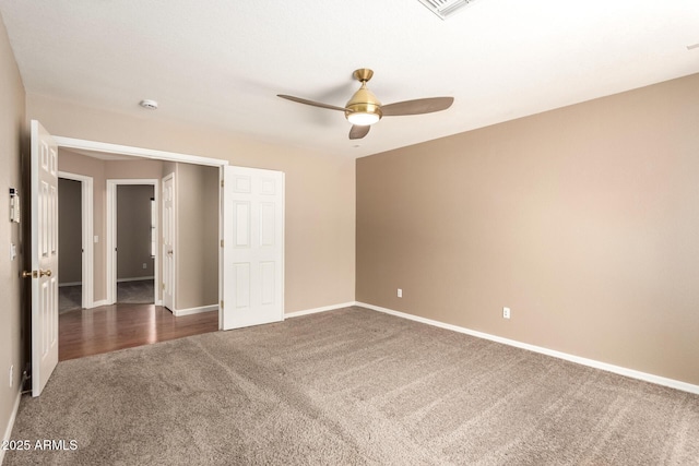 7029 S Golfside Ln, Phoenix, AZ 85042 - unfurnished bedroom featuring carpet and a ceiling fan