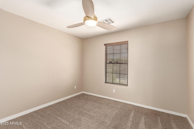 7029 S Golfside Ln, Phoenix, AZ 85042 - empty room featuring carpet and a ceiling fan