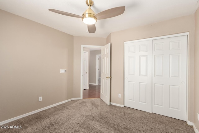 7029 S Golfside Ln, Phoenix, AZ 85042 - unfurnished bedroom featuring carpet flooring, a closet, and ceiling fan