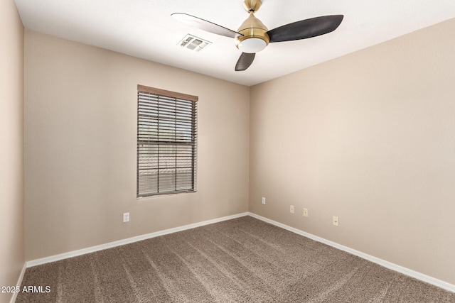 7029 S Golfside Ln, Phoenix, AZ 85042 - spare room featuring carpet floors and ceiling fan