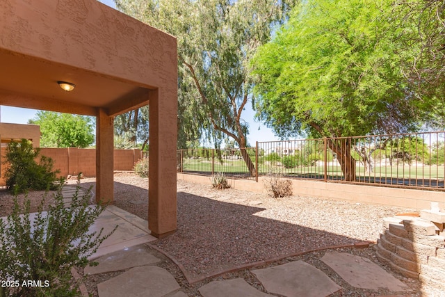 7029 S Golfside Ln, Phoenix, AZ 85042 - fenced backyard featuring a patio